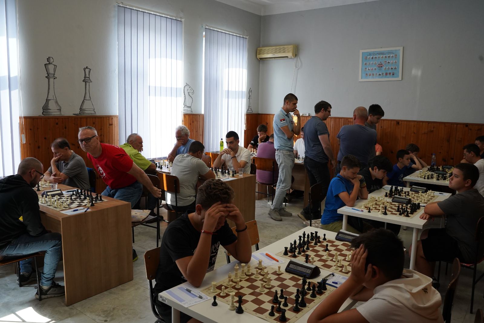 photo of chess players in tournament