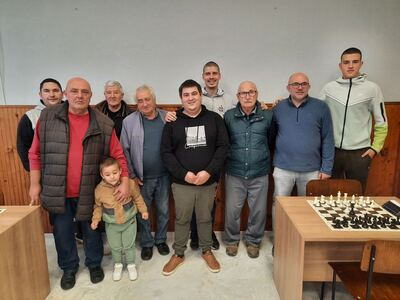 photo of chess players in tournament