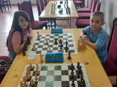 photo of chess players in kids rapid tournament