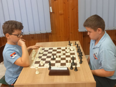 photo of chess players in tournament