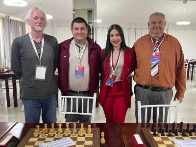 photo of chess players in tournament