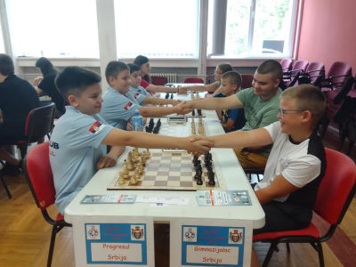 photo of chess players in tournament