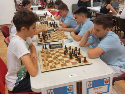 photo of chess players in tournament