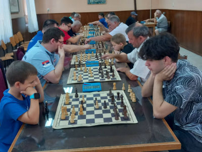 photo of chess players in tournament