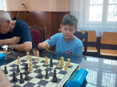 photo of chess players in tournament