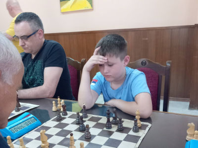 photo of chess players in tournament