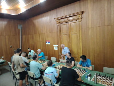 photo of chess players in tournament