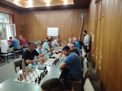 photo of chess players in tournament