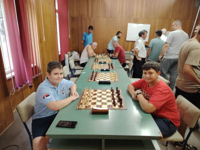 photo of chess players in tournament