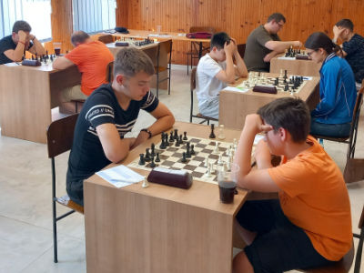 photo of chess players in tournament