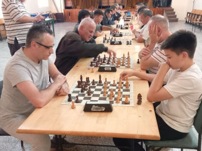 photo of chess players in tournament